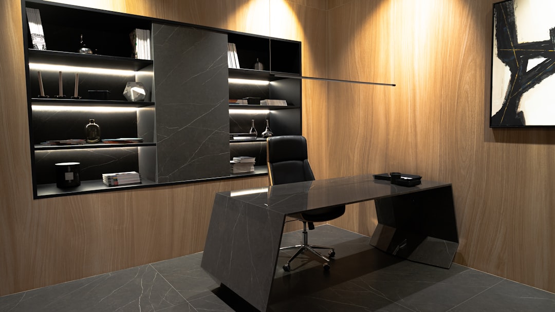 team-01 a-room-with-a-desk-and-a-chair-in-it-vsgc4mr491a